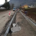 Jusko Grad - polaganje pločnikov in ureditev robnika